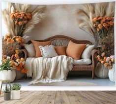 an image of a couch with pillows and flowers on the back wall in front of it