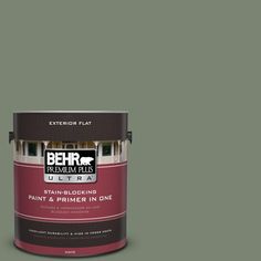 a can of behr paint on a white background