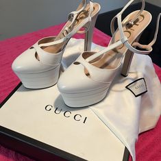 These Are The Gucci Angel Platform In Cream/ Off White Only Worn Once Comes With Dust Bags And Box 100% Authentic Ankle Strap Size 41 Us 11 I Wear A Us 10 But Always Go Up A Size In Designer Gucci Angel Platform, Gucci Designer Platform Heels, Designer Gucci Platform Heels, Luxury White Platform Heels, Gucci White Ankle Strap Heels, Gucci White Round Toe Heels, Luxury White Gucci Heels, Gucci White Heels With Branded Heel Counter, Designer Wedding Platform Heels