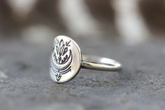 "This listing is for one sterling silver crescent moon and crystal ring. Wear solo or with stacking bands for an irresistibly enchanting bohemian and fun vibe. These rings make a great gift for any witchy woman (or man!) who loves crystals and the moon! - Choose your ring size and stacking options at checkout! - Sterling silver moon and star focal measures approximately 14 mm in diameter. - Ring band is half round for comfortable wear and measures 2mm. - Made to Order. Please check current proce Silver Midi Rings With Moon Phase For Promise, Silver Crescent Moon Phase Ring, Bohemian Silver Moon Charm Ring, Sterling Silver Ring With Moon Charm, Bohemian Silver Ring With Moon Charm, Silver Crescent Midi Rings In Celestial Style, Silver Crescent Dainty Rings, Silver Crescent-shaped Dainty Rings, Dainty Crescent Silver Rings