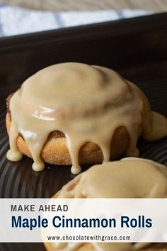 a close up of a doughnut with icing on it and the words make ahead maple cinnamon rolls