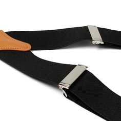 Look to tradition to create a modern, yet sophisticated style. Our Black Clip Suspenders are designed to provide support without sacrificing comfort. The expert craftsmanship of our leather crosspatch suspenders do not restrict movement and will remain in place without slipping or having to adjust. Suspenders add a unique and versatile look that can be dressed up with a suit, or dressed down with jeans and a blazer. Classic Formal Adjustable Belts And Suspenders, Elegant Formal Belts And Suspenders With Adjustable Straps, Elegant Adjustable Belts And Suspenders For Work, Classic Adjustable Belts And Suspenders For Work, Modern Black Leather Belts And Suspenders, Formal Black Belts With Adjustable Strap, Adjustable Belts And Suspenders For Workwear, Elegant Business Belts And Suspenders With Adjustable Strap, Elegant Belts And Suspenders With Adjustable Straps For Business