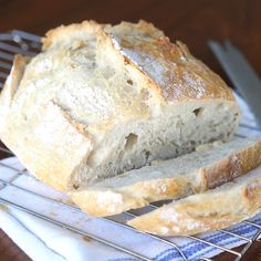 a loaf of bread sitting on top of a cooling rack