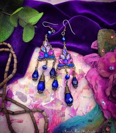 This pair of Handmade Chandelier Earrings is made with rich Cobalt Blue crystal teardrops hanging from a rhinestone-decorated brass pendant.  The Aurora glass stones add a mystical sparkle!  Pierced with french wires (as shown), leverbacks, clip-ons or posts, just select from the pull-down menu. -4 1/4" Long (includes piercing) x 1" Wide -0.3 oz. ea. *These can be shortened up by removing the top bead from the design, upon request. *Comes Ready To Gift in Decorative Packaging -Lovingly Made to Order.     Kerala Rose Pinterest page: https://www.pinterest.com/keralarose3/pins/ To re-enter my shop, Kerala Rose:  https://www.etsy.com/shop/kerala *If you appreciate my work and would like to add a tip to your order... or would like to 'buy me a coffee' :) I would graciously accept one, here: www Victorian Dangle Chandelier Earrings For Parties, Victorian Chandelier Dangle Earrings For Party, Victorian Style Party Chandelier Earrings, Bohemian Jeweled Crystal Dangle Earrings, Bohemian Blue Jeweled Earrings, Bohemian Crystal Chandelier Drop Earrings, Bohemian Jeweled Dangle Chandelier Earrings, Bohemian Crystal Chandelier Earrings, Bohemian Jeweled Chandelier Earrings As Gift