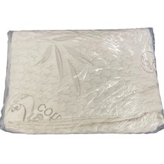 the mattress is wrapped in plastic and ready to be used as a bedding material