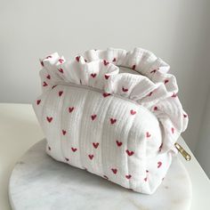 Handmade Frilly Makeup Bag - Red Heart Pattern Makeup Bag - Toiletry Travel Skincare Bag - Heart Makeup Bag 💄💕 This delightful red heart makeup bag is not just a makeup organizer; it's a piece of art! Handmade with love and care, this frilly creation is perfect for keeping your cosmetics in order. Crafted from high-quality quilted cotton, this bag blends durability with style seamlessly. Key Features: Adorable Red Heart Pattern: Fall in love with the charming red heart pattern that adds a sweet touch to your daily routine. ❤️ Handmade with Frills: Each frill is carefully crafted by hand, making this makeup bag a unique and eye-catching accessory. 🎀 High-Quality Quilted Cotton: %100 cotton muslin fabric, both inside and outside, with a fiber fabric layer in between, creates a fuller and Red Heart Makeup, Skincare Bag, Pattern Makeup Bag, Red Heart Pattern, Heart Makeup, Travel Skincare, Red Heart Patterns, My Style Bags, New Business Ideas