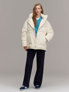 Editor's noteCasual winterpadded jacket that filled with lightweight and warm goose down and feather.Featuring the detachable hood with contrast color, and the drawstring hem andelasticized cuffs that enhanced the warmth of the jacket. The out-pockets withlogo embroidery, and the pockets on the chest are also accentuated. - Overfitsilhouette and high-neck collar- Lightweightand warm- Detachablehood with contrast color detail - Cottonblended fabric with soft texture- Out-pocketswith logo emb Winter Nylon Parka With Ribbed Cuffs, Long Sleeve Duck Down Puffer Jacket With Drawstring Hood, Duck Down Puffer Jacket With Drawstring Hood, Casual Winter White Duck Down Puffer Jacket, Winter White Down Puffer Jacket With Detachable Hood, Hooded Down Puffer Jacket With Ribbed Cuffs, Fall Puffer Jacket With Detachable Hood And Duck Down, Fall Duck Down Puffer Jacket With Detachable Hood, Winter White Duck Down Outerwear For Fall