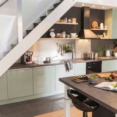 the kitchen is clean and ready to be used as a dining room or office space