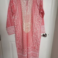 Nwot Embroidered Shirt, Hand Printed In Beautiful Rose Pink Color. Cotton Polyester Mix..Soft Fabric Creme Silk Thread Embroidery On Front Top Bust 19" Shirt Length 40" Sleeve Length 20" Never Used. Brand New Feel Free To Ask Any Questions. Bundle And Save!! Pink Tunic For Eid, Pink Long Sleeve Kurta With Printed Motifs, Cotton Kurta With Embroidered Hem For Eid, Eid Cotton Kurta With Embroidered Hem, Casual Embroidered Dress For Eid, Pink Long Sleeve Dress With Printed Motifs, Pink Long Sleeve Embroidered Dress For Eid, Embroidered Long Sleeve Cotton Dress For Eid, Pink Tunic Dress With Resham Embroidery