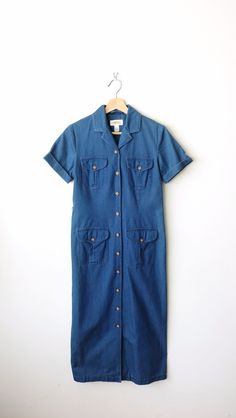 "Women's Blue Denim Short Sleeve Shirt Dress/Maxi Dress. It comes with a waist belt.  Measurements Tagged size        : Women's 2  Length                 : 45\" Armpit to armpit: 17\" Shoulder             : 14 1/2\" Shoulder to end of Sleeve: 6 1/2\" Waist                   : 31\" Hips                     : 36\" Condition           : Gently used. There's no stains or holes. Good condition. ※Please read the policy before you purchase※" Short Sleeve Belted Denim Workwear Dress, Belted Denim Dress With Short Sleeves For Work, Button-up Denim Dress For Workwear, Fitted Button-up Denim Dress For Work, Belted Medium Wash Denim Dress For Work, Summer Short Sleeve Belted Denim Dress, Fitted Denim Shirt Dress With Buttons, Fitted Denim Shirt Dress With Button Closure, Fitted Denim Blue Shirt Dress With Buttons