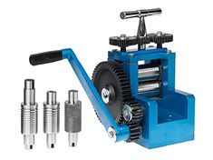 an image of a machine that is being used to make screws and other items