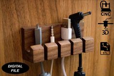 an electric outlet plugged into a wooden wall with multiple cords and plugs attached to it