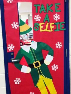 a door decorated with an elf and let's take a selfie