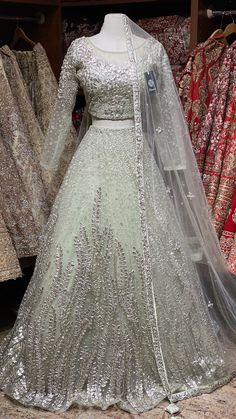 a dress and veil on display in a store