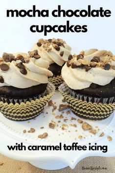 chocolate cupcakes with caramel toffe icing are on a white plate