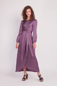 Feel more confident than ever before in the Satin Wrap Maxi Dress with Puff Sleeves that combines modesty with today’s most current modest fashion trends. The sleek satin maxi dress accentuates the waist with a luxurious wrap design while the puff sleeves accent a bold shoulder and feminine shape. Perfect for every special occasion, the unique dress comes in multiple colors to best fit your individual personality. Belted Floor-length Maxi Dress, Belted Floor-length Maxi Dress For Party, Evening Belted Maxi Dress, Chic Belted Floor-length Maxi Dress, Evening Maxi Dress With Belt, Solid Belted Maxi Dress For Evening, Fitted Long Sleeve Maxi Dress With Belt, Evening Maxi Dress With Tie Waist, Belted Maxi Dress For Party