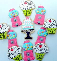 decorated cookies arranged in the shape of cupcakes