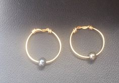 "Replica of beautiful temple rings made based on multiple findings. Diameter approximately 1-1 1/8\" (2.5-3 cm) Temple rings made of brass with various glass beads. Just pick the option you like the best. Those temple rings will be perfect addition to your Slavic costume. They will work for SCA, Adrian empire, and Living history events. If you would like to have similar temple rings made of different material: copper or sterling silver, or with a different beads (gemstone or glass) just message Adjustable Small Hoop Stackable Jewelry, Gold Hoop Spiritual Jewelry, Nickel-free Copper Ring, Artisan Round Spacer Beads Jewelry, Artisan Stackable Round Jewelry, Spiritual Copper Jewelry With Round Beads, Spiritual Nickel-free Round Beads Jewelry, Spacer Beads Small Hoop Jewelry For Gift, Small Hoop Spacer Beads Jewelry For Gift