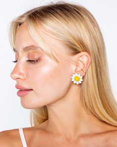 OFFICIAL COLLABORATION WITH SMILEY® Everything is better with a smile. Don't you feel the same? Keep the vibes happy in these adorable daisy smiley earrings! Details: 14k gold plated zinc studs 1 inch width The earring post is made of surgical steel Set of 2 studs final sale Everyday Daisy-shaped Jewelry For Spring, Everyday Daisy-shaped Spring Jewelry, Trendy Daisy-shaped Spring Jewelry, Daisy Flower Earrings For Spring, Spring Daisy Flower Earrings, Trendy Hypoallergenic Flower Earrings For Spring, Everyday Daisy Earrings, Playful White Earrings For Spring, Daisy Shaped Earrings For Summer