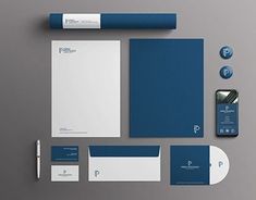 the stationery is laid out neatly and ready to be used as an office suite