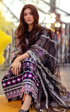 Pakistani Eid Dresses in Black Designer Salwar Kameez is emblazoned with beautiful print and embroidered patch. Summer Collection is very stylish and you can wear these dresses at Party or Eid Events. Buy an Online designer's new collection at this store and change your look. Shirt: Pretty Shirt in black white color is embellished with a front and plain back on the lawn fabric. The shirt neckline is decorated with the embellished bunch and daman is also embellished with embroidered patch on slee Pakistani Eid Dresses, Bridal Makeup For Blondes, Dresses In Black, Designer Salwar Kameez, Pakistani Fancy Dresses, Designer Salwar, Eid Dresses, Bridal Dress Fashion, Pretty Shirts