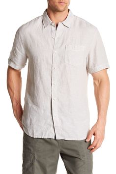 A short sleeve solid linen shirt is a perfect pick for your next vacationFit: this style fits true to size. Modern fit. Spread collar. Short sleeves. Front placket. Chest patch pocket with button closure. Topstitching detail. Curved shirttail. Approx. 30" length (size M). Imported Linen Shirt With Spread Collar And Placket, Classic Short Sleeve Shirt For Beach, Linen Shirt With Placket For Casual Gatherings, Casual Linen Shirt With Placket, Casual Linen Shirt With Button Closure, Linen Shirt With Buttons For Casual Gatherings, Unstructured Linen Shirt With Placket, Beach Linen Shirt With Button Closure, Linen Beach Shirt With Button Closure