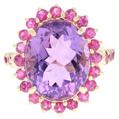 This ring has a Amethyst that weighs 9.49 carats and has 28 Pink Sapphires that weigh 1.37 carats. The total carat weight of the ring is 10.86 carats. The ring is crafted in 14 Karat Yellow Gold and weighs approximately 5.9 grams. The ring is a size 7 and can be re-sized at no additional charge. Jewellery Rings, Pink Men, Easter Greetings, Eye Makeup Art, Women Diamond, Yellow Gold Ring, Diamond Gemstone, Pink Sapphire, Yellow Gold Rings