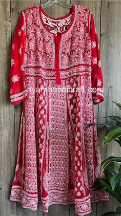 Gorgeously hand embroidered georgette Anarkali in a gorgeous red color. Beautiful craftsmanship, neatly embroidered. Anarkali Length : 48 inches Red Anarkali Set With Floral Embroidery Straight Kurta, Red Floor-length Traditional Wear With Floral Embroidery, Red Semi-stitched Anarkali Set With Floral Embroidery, Red Floral Embroidered Anarkali For Eid, Red Floral Embroidered Anarkali Set For Eid, Red Traditional Wear With Floral Embroidery For Transitional Season, Red Anarkali Set With Floral Embroidery For Festivals, Red Kurta With Floral Embroidery For Transitional Season, Red Floral Embroidery Anarkali Set For Festivals