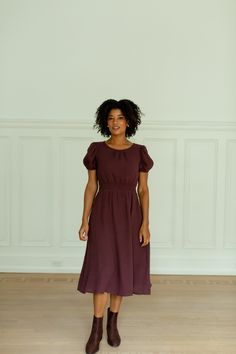 A bestseller, now in a new print + shade! The 'Alicia' midi dress is made out of a comfortable and breathable cotton gauze fabric. Choose between a beautiful dainty floral pattern, or an elegant plum color. Or maybe you just need both! Add low ankle boots and a shoulder bag for a charming fall brunch look with friends! Exclusively designed by us with you in mind. 100% Cotton Hand Wash Cold Do Not Bleach Hang to Dry Low Iron if Needed Do Not Dry Clean Fully Lined Maternity/Bump Friendly! Model in Non-stretch Cotton Midi Dress, Modest Midi-length Dress With Relaxed Fit, Modest Relaxed Fit Dress For Daywear, Relaxed Fit Knee-length Midi Dress For Daywear, Flowy Knee-length Midi Dress For Daywear, Modest Knee-length Flowy Dress, Modest Knee-length Midi Dress With Relaxed Fit, Fall Brunch, Low Ankle Boots