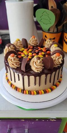 a decorated cake sitting on top of a white plate