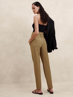 A classic pant, cut here in a high-rise slim silhouette with utilitarian top-stitch detailing.  For fabric, our designers selected a bi-stretch woven from LENZING™ ECOVERO™, beloved for its softness, high-stretch and dressed-up appearance.  SLIM FIT: High rise.  Slim through hip and thigh, gentle taper from knee to hem.  SUSTAINABILITY: Made with LENZING™ ECOVERO™, a breathable fiber derived from certified renewable wood sources, produced using methods that reduce water impact and emissions by up to 50% compared to traditional viscose.  Zip fly with hook-and-bar closure.  Belt loops.  Detachable belt.  Front pockets.  Back pockets.  Unlined.  Slim fit: High rise (9. 75").  Slim leg.  Tapered ankle.  Full length.  Inseams: Short 25", Regular 27", Tall 30" Model: Size 25, 5'10" (178cm). Utility Style Stretch Bottoms For Work, Stretch Utility Bottoms For Workwear, Workwear Bottoms With Belt Loops And 4-way Stretch, Minimal Stretch Workwear Bottoms With Pockets, Tapered Leg Pants With Seam Detailing For Workwear, Utility Style Ankle-length Workwear Pants, Utility Ankle-length Workwear Pants, Fitted Utility Pants For Workwear, Classic Pants