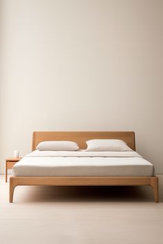 the bed is made up and ready for someone to use it in their home or office