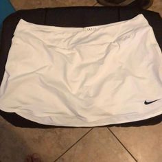 White Nike Tennis Skirt Size Xl. Built In Underwear. Never Worn Great Condition Nike Sporty White Skirt, Nike White Skort For Spring, Nike White Tennis Skirt For Spring, Nike White Fitted Tennis Skirt, Fitted White Nike Tennis Skirt, Nike White Lined Skirt, Nike White Casual Skort, Nike White Skirt For Spring, Fitted White Nike Skirt