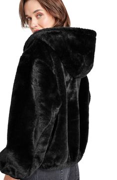 Ultraplush faux fur ensures you'll feel as cozy as you look in this elevated hoodie ready for chilly days. 26 1/2" length Front zip closure Fixed hood Ribbed cuffs Side-seam pockets Lined 100% polyester faux fur Machine wash, tumble dry Imported Cozy Hooded Faux Fur Outerwear, Black Fluffy Hooded Outerwear, Casual Hooded Faux Fur Coat, Casual Hooded Fluffy Fur Coat, Black Hooded Fur Coat With Faux Fur Lining, Hooded Faux Fur Outerwear With Plush Lining, Faux Fur Hooded Jacket For Cold Weather, Black Hooded Faux Fur Outerwear, Black Hooded Fur Coat With Detachable Hood