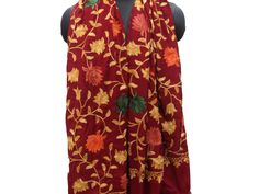 Pattern - red Kashmiri shawl with floral embroidery. Ideal for - women. Occasion - formal or casual. Fabric - cotts wool, it is a blend of cotton and wool which is very soft and has a fine texture. Color - maroon. On maroon background, embroidery is in different colored threads all over displaying floral patterns. Size - Width - 41 x 80 inches approx. Care- gentle hand wash. For more such scarves please visit- https://www.etsy.com/in-en/shop/vibrantscarves?ref=seller-platform-mcnav&section_i Multicolor Embroidered Shawl With Traditional Drape, Red Pashmina Shawl With Resham Embroidery For Festivals, Red Embroidered Pashmina Shawl, Elegant Embroidered Red Pashmina Shawl, Elegant Red Shawl With Traditional Drape, Festive Red Pashmina Shawl With Resham Embroidery, Pashmina Shawl With Floral Embroidery, Festive Winter Dupatta With Embroidered Border, Traditional Floral Embroidered Festive Scarves