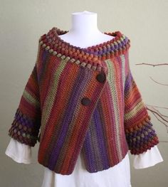 a woman's sweater with buttons on the front and sleeves, made from multicolored yarn