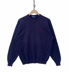 "Vintage Polo Ralph Lauren Sweatshirt SS275 Measurements: Width (armpit to armpit): 23\" Length (shoulder to end of garment): 26.5\" All measurements are taken with the garment flat on the ground. Refer picture carefully Condition: Good Condition. (used clothing) THANK YOU" Casual Polo Sweater With Crew Neck, Casual Polo Sweater With Ribbed Collar For Streetwear, Sporty Crew Neck Polo Sweater, Sporty Cotton Polo Sweater With Relaxed Fit, Cotton Polo Sweater With Ribbed Cuffs For Streetwear, Sporty Cotton Polo Sweater, Casual Polo Sweater With Ribbed Cuffs, Casual Crew Neck Polo Sweater, Sporty Cotton Polo Sweater With Crew Neck