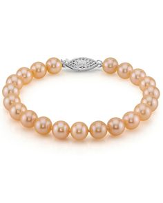 This gorgeous pearl bracelet is a recent addition to The Pearl Source and is sure to be a favorite. The bracelet consists of 7-8mm AAA quality freshwater pearls with 'Very High' luster, our highest grade available in every category. The brilliant color of this bracelet would also go great with one of our exquisite peach freshwater necklaces. The pearl bracelet is affixed with a beautiful 14K white or yellow gold clasp. Peach Necklace, Conch Pearl, Single Pearl Necklace, Queen Jewelry, Pearl Bracelets, Mother Of Pearl Jewelry, Pearl Jewelry Wedding, Freshwater Pearl Bracelet, Pearl Leather