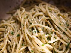 a close up view of some noodles in a bowl