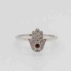 Vintage Sterling Silver Garnet & White Topaz Hamsa Ring ....Marked 925...Total of weights 1.7grams...Size 8...Measure of Face 10.9MM...It's in very good condition. White Gold Sterling Silver Topaz Ring Gift, White Gold Topaz Ring In Sterling Silver As Gift, Sterling Silver Crystal Ring With Diamond Accents, Silver-toned Cubic Zirconia Ring With Birthstone, Silver Cubic Zirconia Diamond Ring With Birthstone, Sterling Silver Birthstone Ring With Diamond Accents, Sterling Silver Rings With Birthstone In Diamond White, Sterling Silver Rings With Diamond White Birthstone, Silver Diamond Ring With Birthstone In Cubic Zirconia