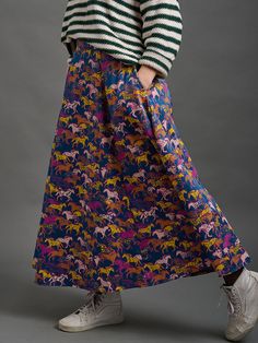 A creative custom-designed print is featured on this colorful maxi skirt. Pair with sneakers and a sweater or a fitted top and booties for a comfortable fall look. 100% Satin weave cotton Zips at back Length of size M is 36" Made fair trade in India by one of our longstanding production partners Maxi Skirt Blue, Fair Trade Clothing, Blue Horse, Indigo Dye, Fitted Top, Fall Looks, Cut And Style, Cotton Weaving, Fair Trade