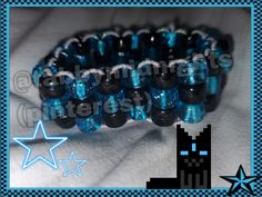 blue and black beaded bracelet with stars