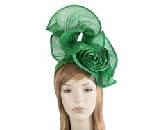 This green fascinator is made to perfection in Australia and will be a perfect addition to your Melbourne Cup racing outfit. Beautiful drape design coupled with luxurious silk abaca fabric create really magnificent look that will turn heads. Please allow few days for creation of your perfect fascinator.  Made in Australia  Bespoke design  Headband for easy wear Elegant Green Headband For Party, Elegant Fitted Green Headband, Elegant Green Headband For Races, Green Headband For Royal Ascot Wedding, Green Headband For Wedding At Royal Ascot, Green Wedding Headband For Royal Ascot, Green Headband For Royal Ascot Party, Elegant Green Headband For Spring, Elegant Green Summer Headband