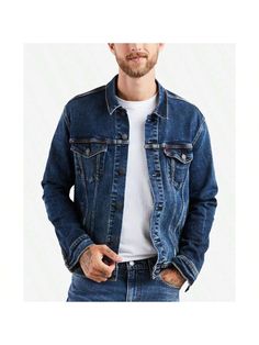 The original jean jacket since 1962. Features a standard fit with a hem that hits below the waist and welt hand pockets. We suggest ordering true to size for a tailored fit, or size up for a more relaxed fit. 
Regular Fit; Button front closure and button cuffs. 
Straight on the body; hits below the waist 
Two side welt pockets; two flap chest pockets 
cotton/elastane 
Machine washable 
Imported 
Men's Regular Fit Stretch Denim Trucker Jacket Colusa Casual  Long Sleeve  Plain    Men Clothing, siz Trucker Jacket Men, Denim Trucker Jacket, Denim Jacket Men, Trucker Jacket, Denim Jackets, Levis Men, Men Clothing, Mens Denim, Welt Pockets