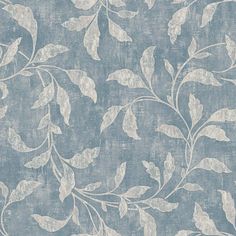 a blue and white floral wallpaper with leaves on the back drop in shades of grey