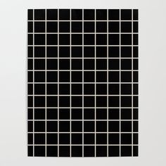 a black and white square pattern on a wall