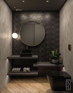 a bathroom with a sink, mirror and lights on the wall next to wooden flooring