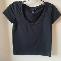 Forever 21. Black Semi Cropped Tee. Fits At Waist, Or Right Above On My 5ft Girl So If Your Tall It Will Be Shorter. Size S. Never Worn. Scooped Neck. Fitted Black Cropped T-shirt For Everyday, Black Cotton Scoop Neck Crop Top, Trendy Scoop Neck Tops For Streetwear, Forever 21 Cotton Tops For Streetwear, Forever 21 Fitted Top For Everyday, Forever 21 Fitted Everyday Top, Forever 21 Black Short Sleeve Top, Fitted Forever 21 Top For Everyday, Trendy Forever 21 Tops For Everyday