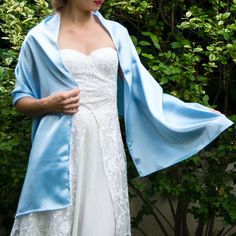 A very elegant satin shawl for your wedding party or evening dress. Made of a classical satin. Color: light blue ( other colors are available ) Size : 170 cm x 40 cm You can use it as a wrap, shawl or stola. WE have matching bags in our Etsy Shop! WE accept credit cards! Elegant Blue Satin Silk Scarf, Elegant Silk Scarf With Satin Finish For Weddings, Elegant Blue Silk Shawl Scarf, Elegant Blue Silk Shawl, Elegant Blue Silk Scarf For Wedding, Elegant Blue Silk Scarf For Evening, Elegant Silk Wraps For Wedding, Elegant Silk Wedding Wrap, Elegant Silk Wedding Wraps