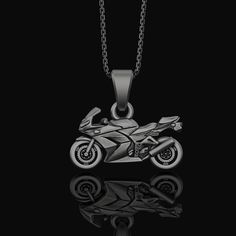 "Motorcycle, Pendant, Biker, Jewelry, Men's Accessory, Engine, Rider, Motorcycle Charm, Road, Engine Jewelry, Rider Charm Pendant Ignite the open road with our Motorcycle and rider-inspired jewelry collection. This range is tailored for the modern-day biker who finds freedom on two wheels. Each piece, from our engine jewelry to motorcycle charms and rider charm pendants, reflects the spirit of the road, making them the perfect companion for your journey. Whether you're a biker or a motorcycle en Motorcycle Necklace, Bike Jewelry, Motorcycle Aesthetic, Pretty Bike, Biker Jewelry, Inspired Jewelry, Open Road, Silver Pendants, Personalized Products